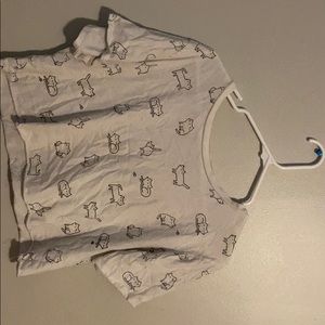 A shirt with cats on it